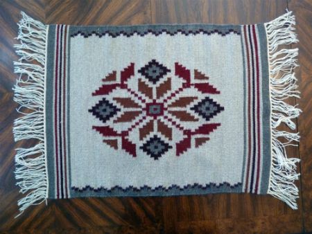 Hand-woven 'Pajaritos' rug, by Yvonne Ebelacker from Santa Clara Pueblo